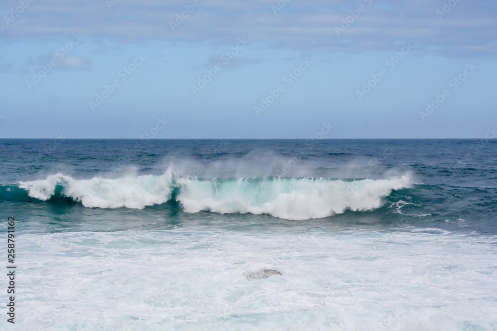 great crashing waves on the rock coast