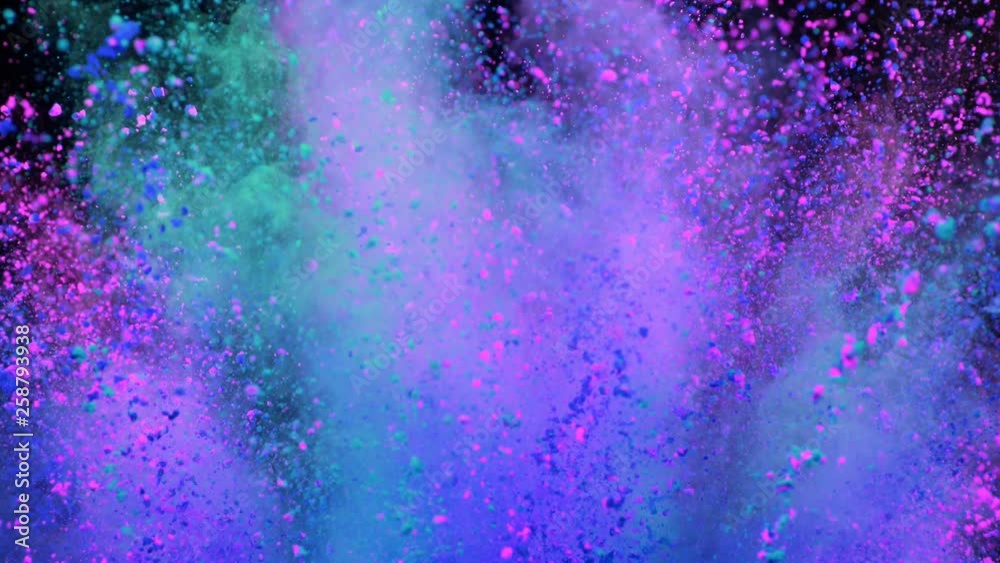 Super slowmotion shot of color powder explosion isolated on black background.
