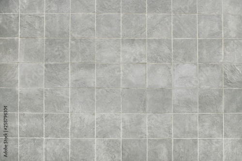 Grey tile wall background texture