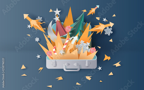 Foto illustration of bonfire and fireworks art decorations in christmas with suitcase concept
