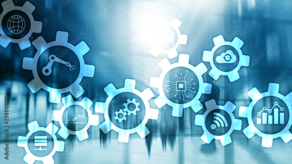 Automation technology and smart industry concept on blurred abstract background. Gears and icons. Automation technology and smart industry concept on blurred abstract background. Gears and icons.