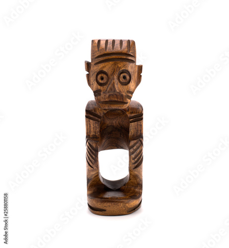 Wooden figurine on a white background