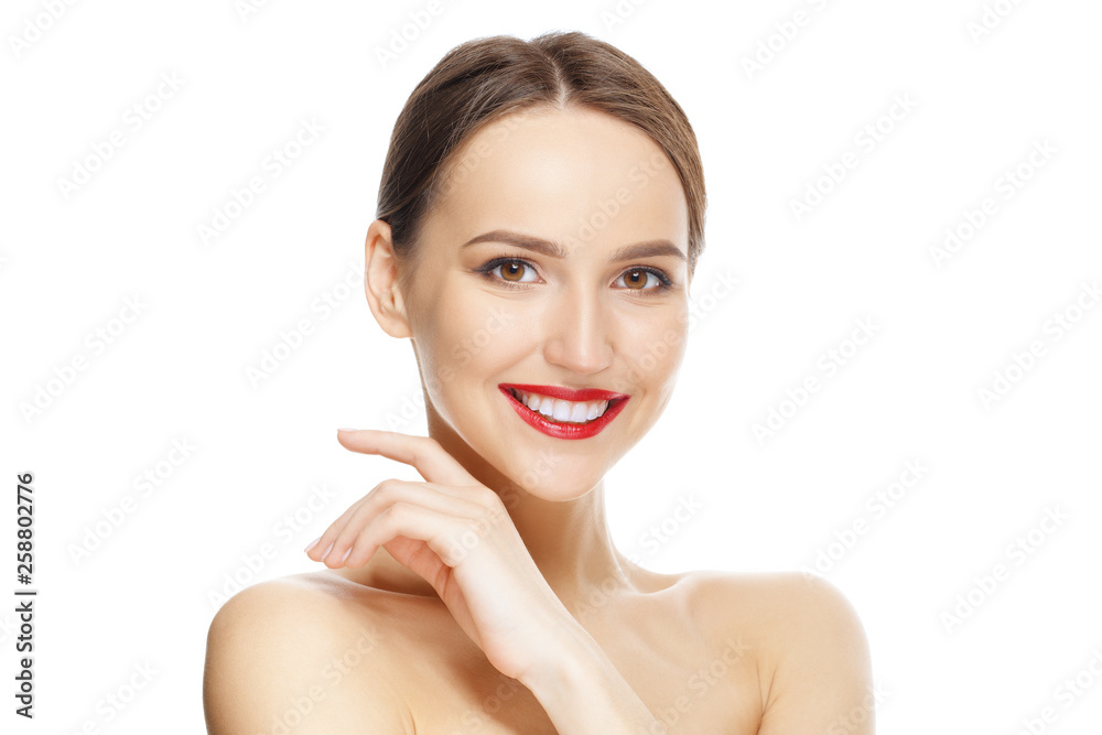 Teeth and skin care. Beautiful young woman with fresh skin and red lips looking straight and demonstraiting healthy teeth. Teeth and skin care. Beautiful young woman with fresh skin and red lips looking straight and demonstraiting healthy teeth.