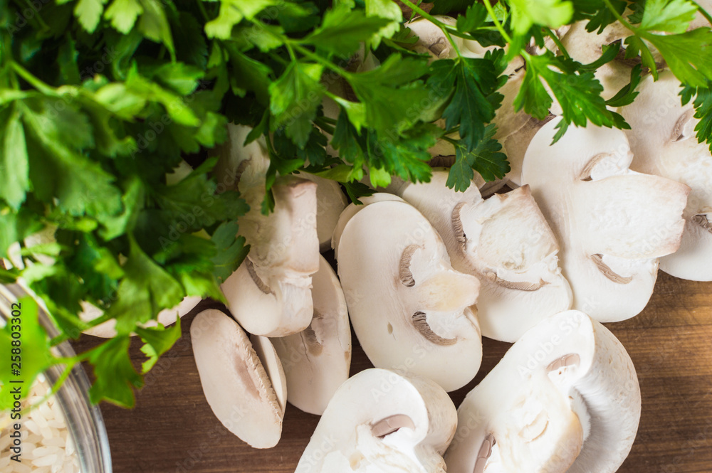 Fototapeta premium Cooking time. Slice of organic mushrooms on the table.