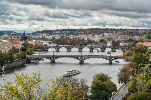 Gorgeous view on Prague city center, Vltava river and cascade of bridges, Czech Republic. Autumn Prague. © esvetleishaya