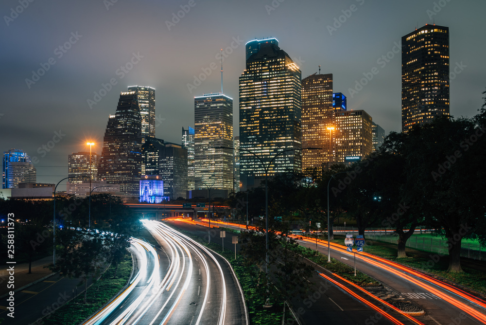 Long exposure of traffic on Allen Parkway and the Houston skyline at night, in Houston, Texas