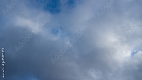 dark blue sky with white clouds