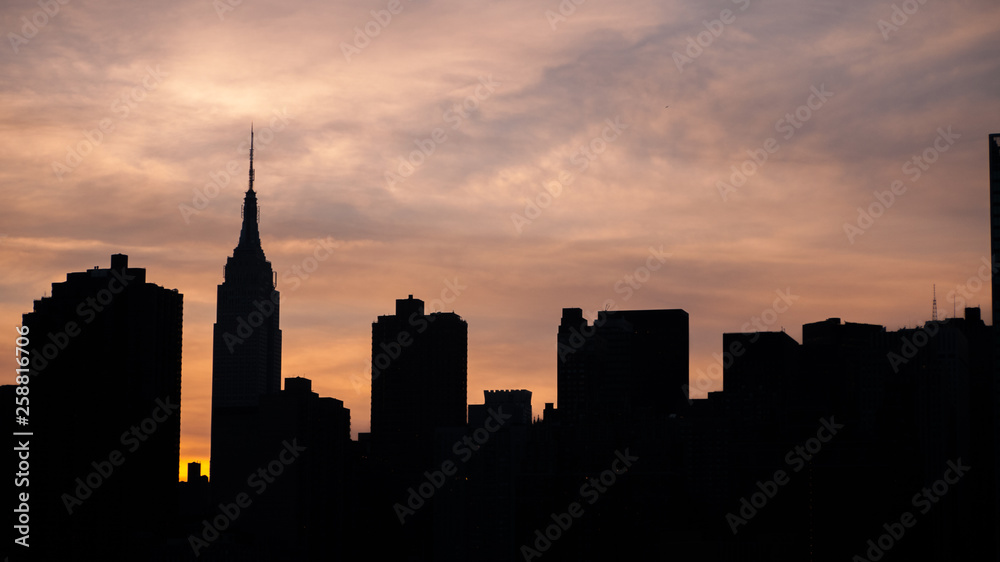 new york city skyline at sunset new york city skyline at sunset