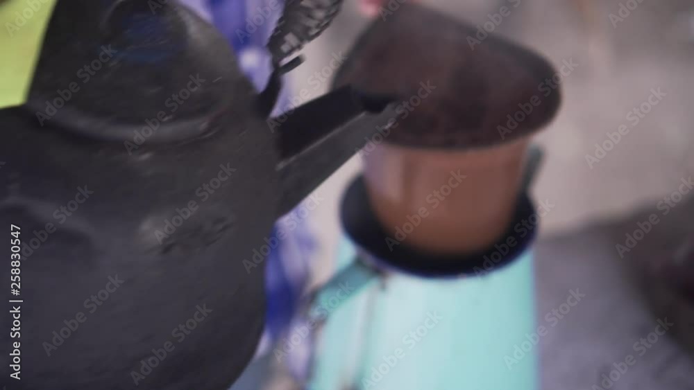Traditional latino coffee making whit strainer Traditional latino coffee making whit strainer