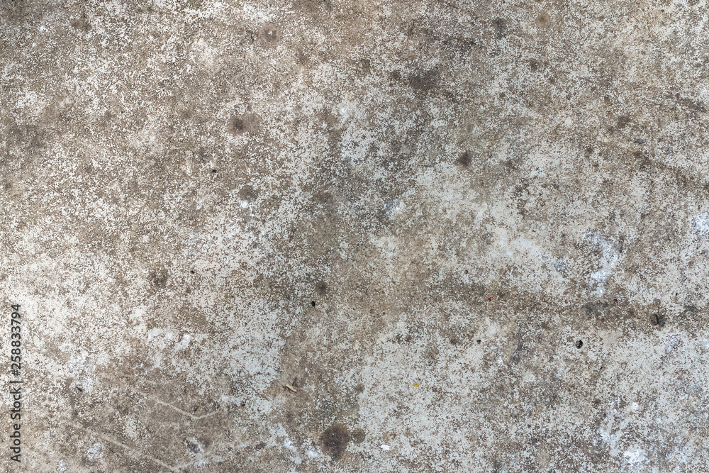 Background texture of an old concrete wall with cracks for mockup or design pattern in construction, food or industrial sample concept layout Background texture of an old concrete wall with cracks for mockup or design pattern in construction, food or industrial sample concept layout