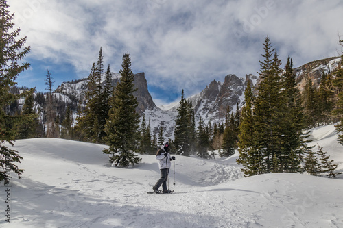 Man snowshoeing in Rocky Mountains National Park, Colorado