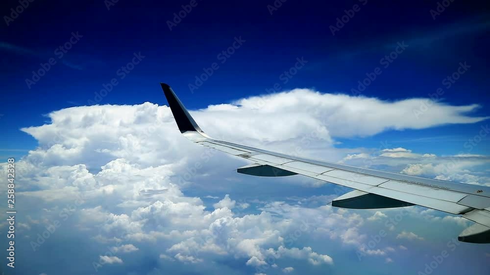 amazing clear blue sky with clouds,airplane windows view amazing clear blue sky with clouds,airplane windows view