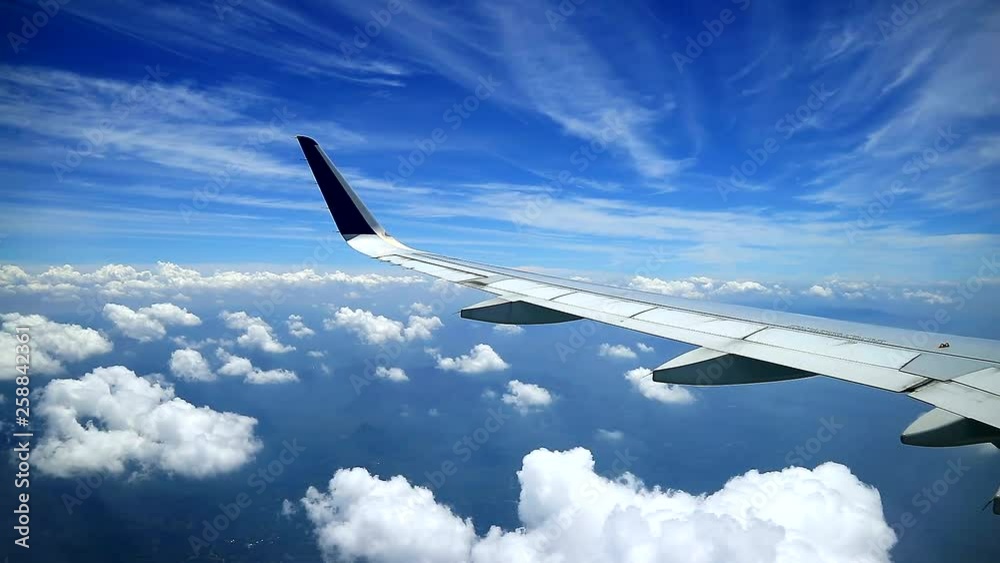 cloudy bluesky and ocean view from airplane windows cloudy bluesky and ocean view from airplane windows