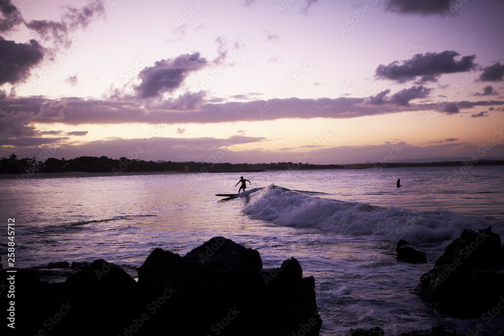 Surfing sunset
