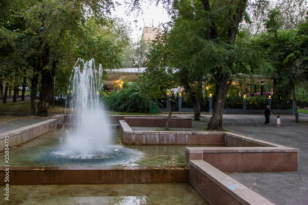 City fountain with running water in the Summer evening, Almaty, Kazakhstan