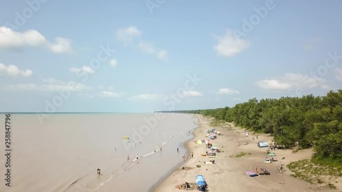 Lake Erie, beach and turbid water after storm. Aerial view. 4k photo