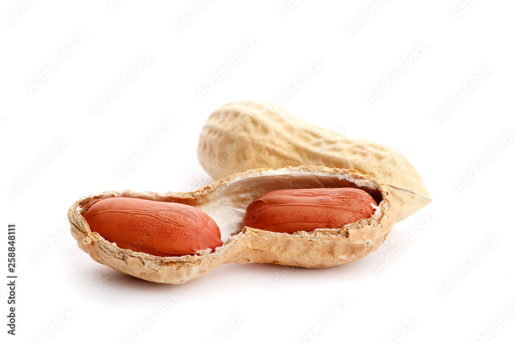 Raw peanuts on white background. Healthy snack ona white background. Top view. close-up. Raw peanuts on white background. Healthy snack ona white background. Top view. close-up.