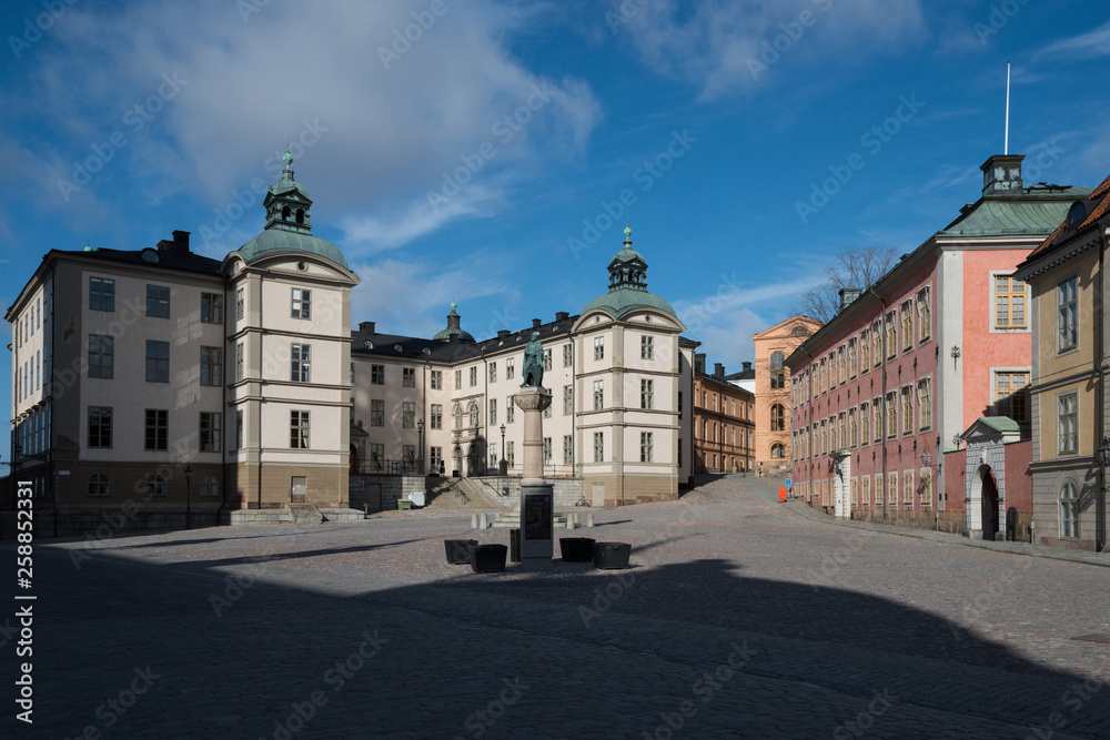 An sunny spring day at the Riddarholmen island in Stockholm with old courthouses and medieval church