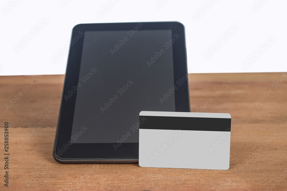 Credit card or debit card on tablet ,shopping online concept. Credit card or debit card on tablet ,shopping online concept.