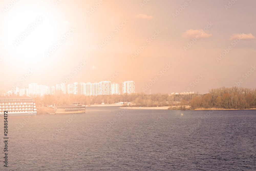 Fototapeta premium Fabulous sunset over the river. Spring evening landscape.