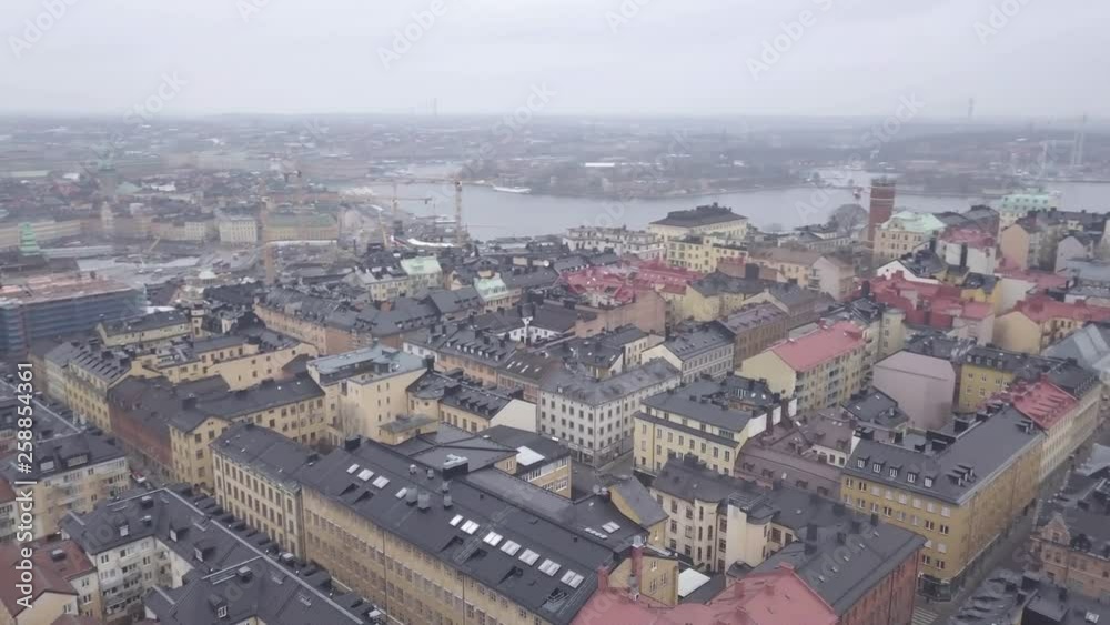 4K drone orbit of Stockholm city during winter overlooking the old city, reflections in the water and more. 4K drone orbit of Stockholm city during winter overlooking the old city, reflections in the water and more.