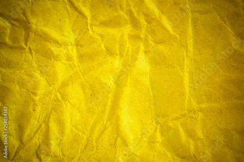 Texture crumpled yellow paper background.