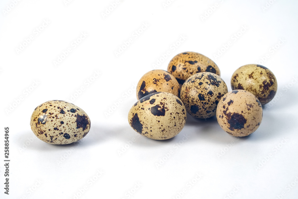 Fresh Quail eggs on background.Food and health concept.