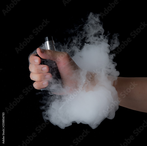 Man holding e-cigarette with smoke,vaping device
