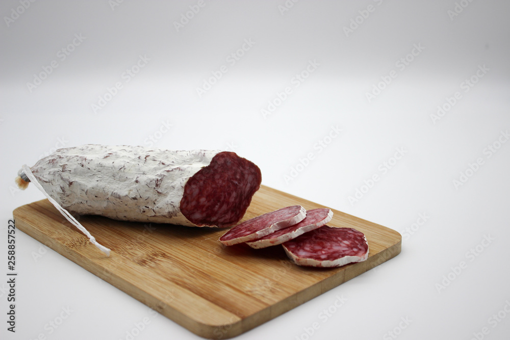 Fuet Is A Catalan Thin, Dry Cured, Sausage Of Pork Meat In A Pork Gut. Fuet Is A Catalan Thin, Dry Cured, Sausage Of Pork Meat In A Pork Gut.