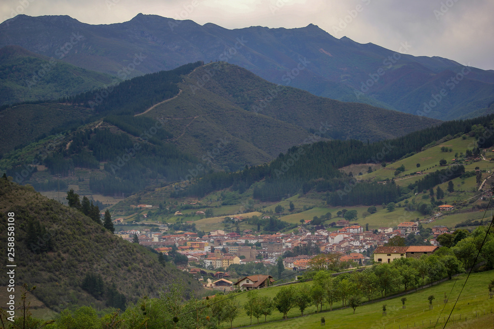 Spanish village in avalley surounded with mountains