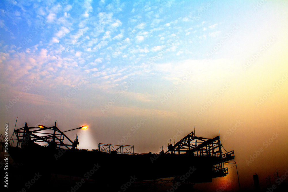  Bridge construction site and evening sky