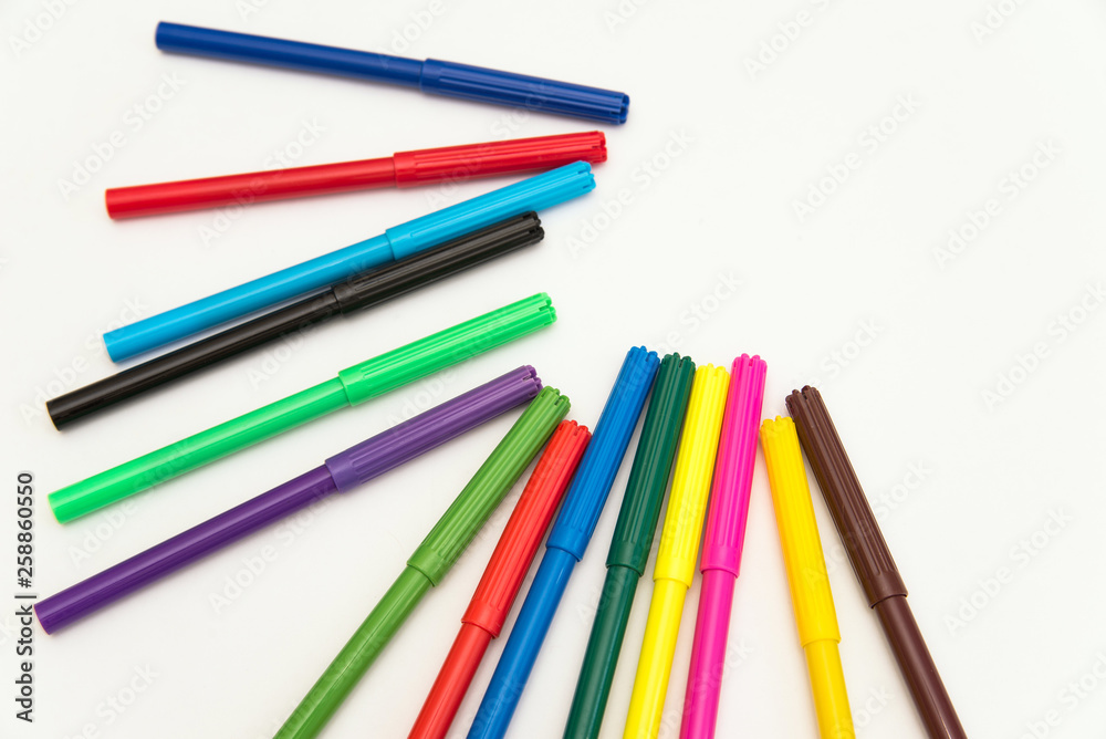 Multi-colored felt-tip pen for drawing in school or at home on a white background