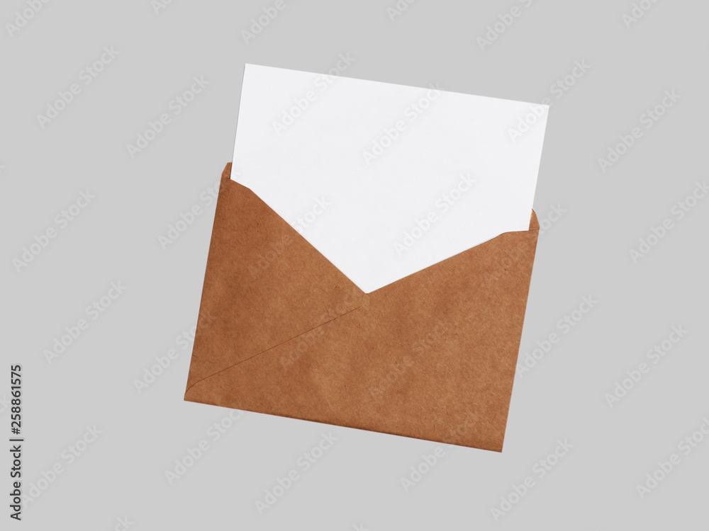 Craft envelope with a white sheet of paper on a white background Craft envelope with a white sheet of paper on a white background