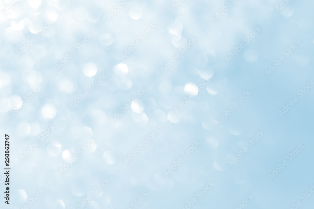 Abstract natural bokeh background in white and blue colors