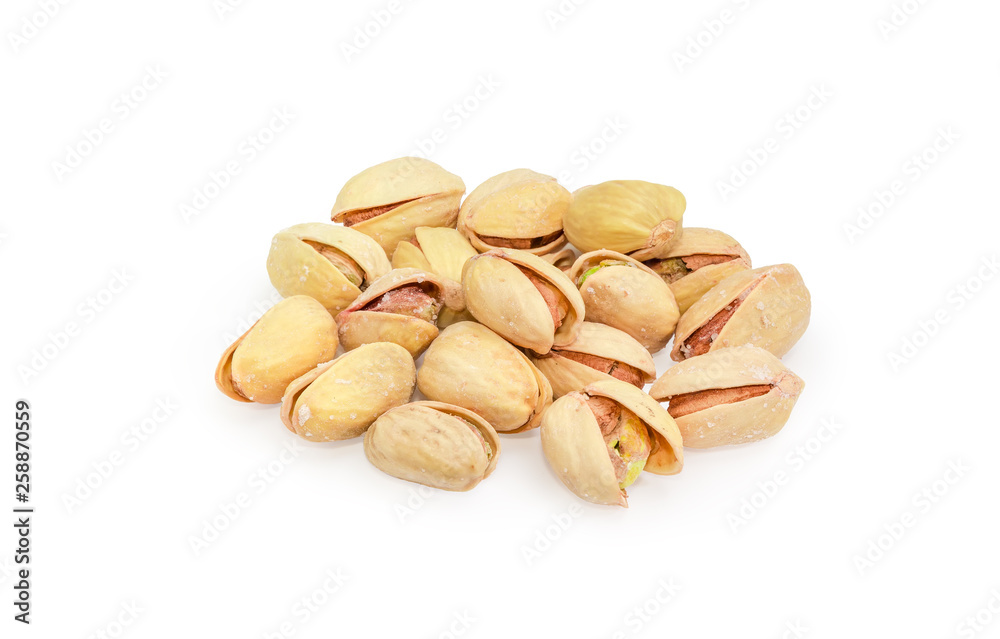Pile of the roasted salted pistachio nuts with shells