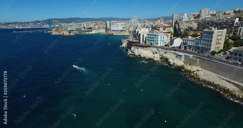 Aerial of France, Cote d'azur, Menton, old city houses and sea wtih boat in French riviera