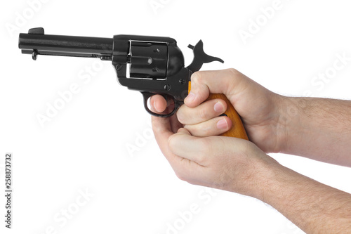 Hands with revolver