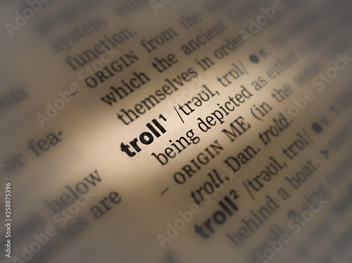Fotografija A close up of the a dictionary page showing the highlighted word: troll