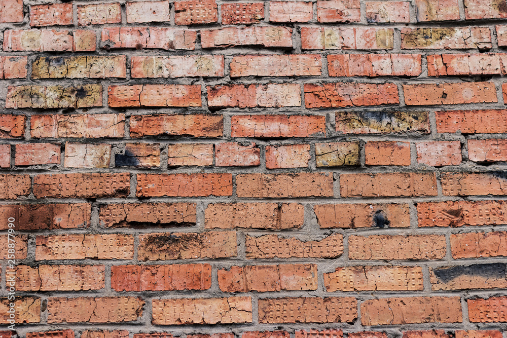 Obraz premium The brick texture, wall, with cracks and scratches