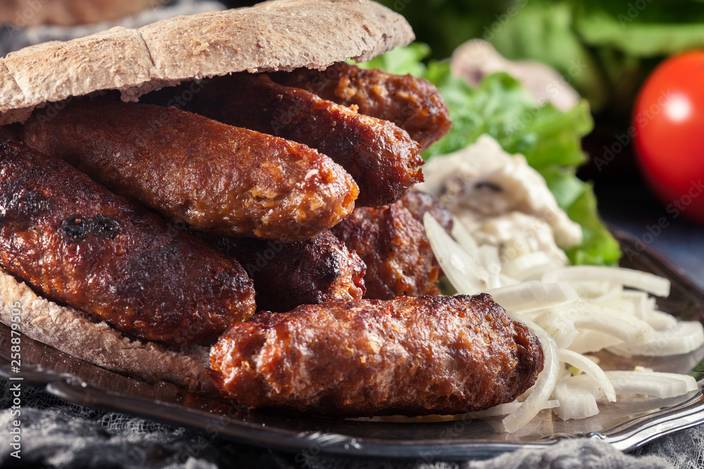 Cevapcici or cevapi served with lepinja bread