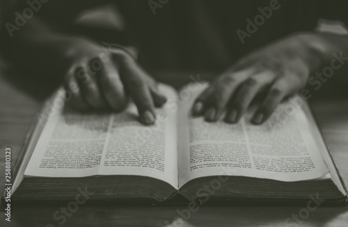 Hands man Open the holy bible with copy space.