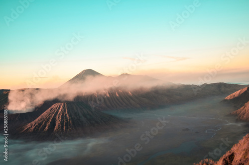 Beautiful colorful sunrise over Mount Bromo and wild island in Mount Bromo National Park