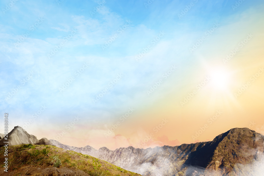 Fototapeta premium Panoramic views of top of the mountain with clouds fog