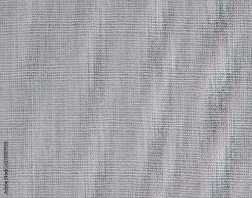 Textured background of gray natural textile 