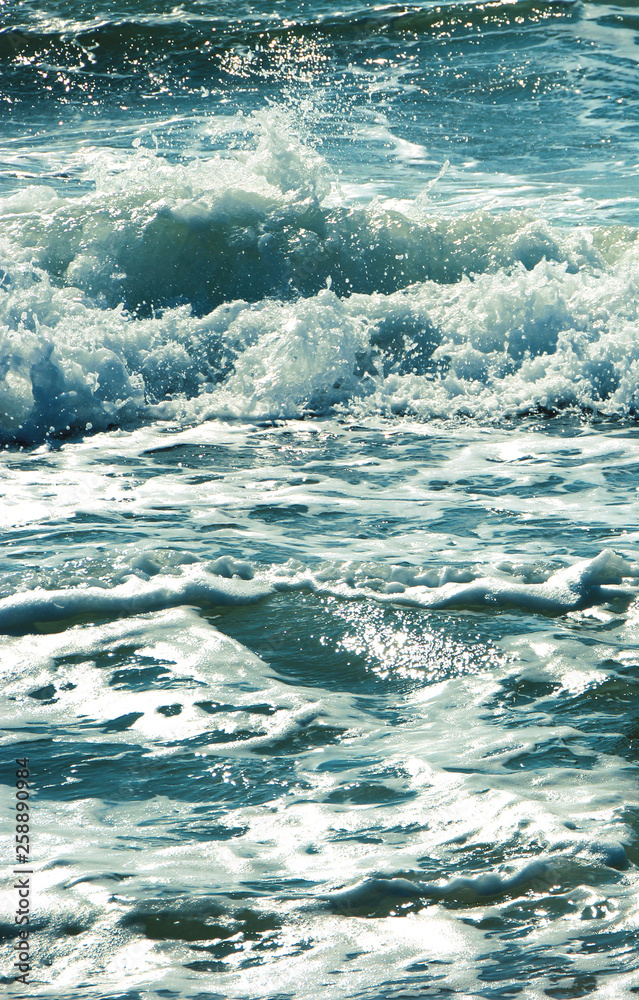 Sea wave splashing water