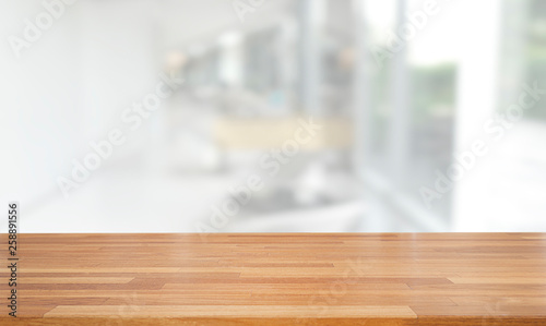 Empty wooden table and blurred modern white abstract background, Ready for product montage, indoor and window