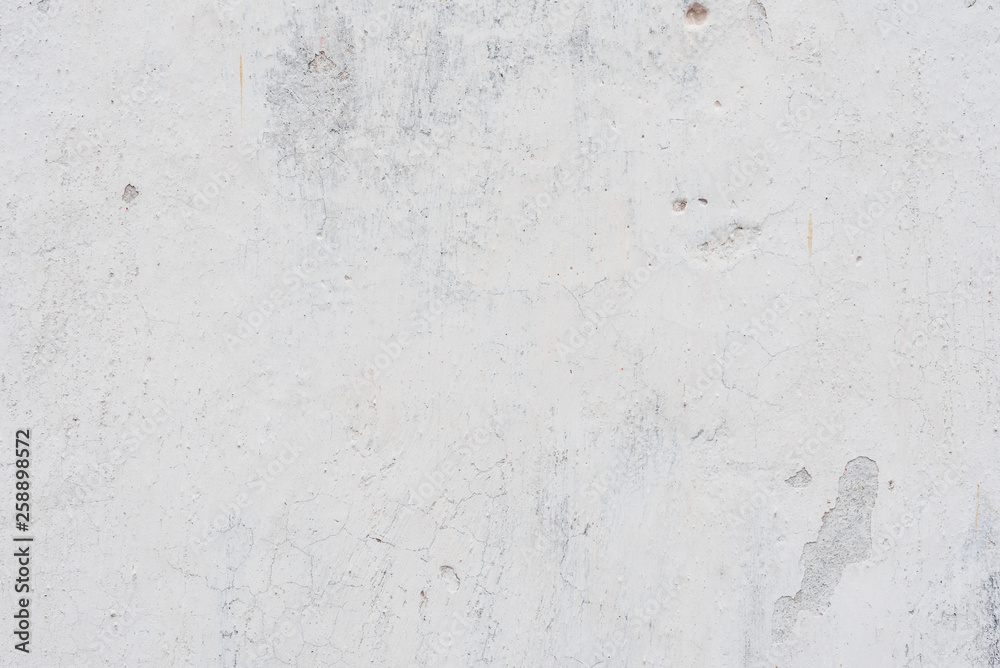 Fototapeta premium Wall fragment with scratches and cracks