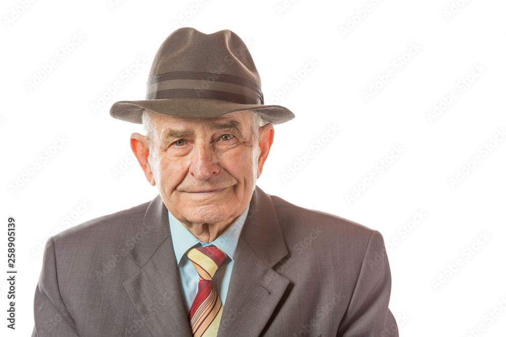 Portrait of 90 year old senior man in retro hat looking at camera isolated on white background. Portrait of 90 year old senior man in retro hat looking at camera isolated on white background.
