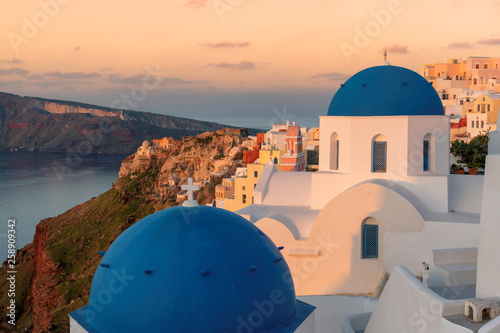 Beautiful sunrise view of Oia village on Santorini island, Greece.