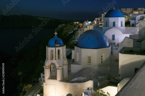 Night view of Oia village in Santorini island, Greece.